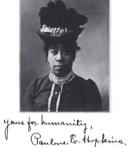 Black and white photo of Pauline Hopkins in middle age, facing camera and wearing an enormous black hat the script below reads yours for humanity Pauline E Hopkins
