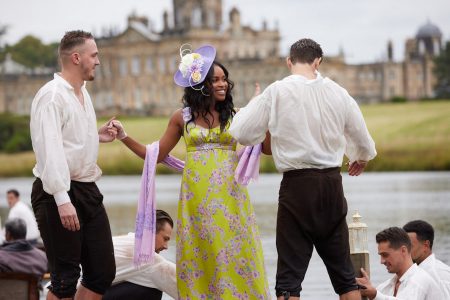 Nicole and two of the wet dudes stand by the lake
