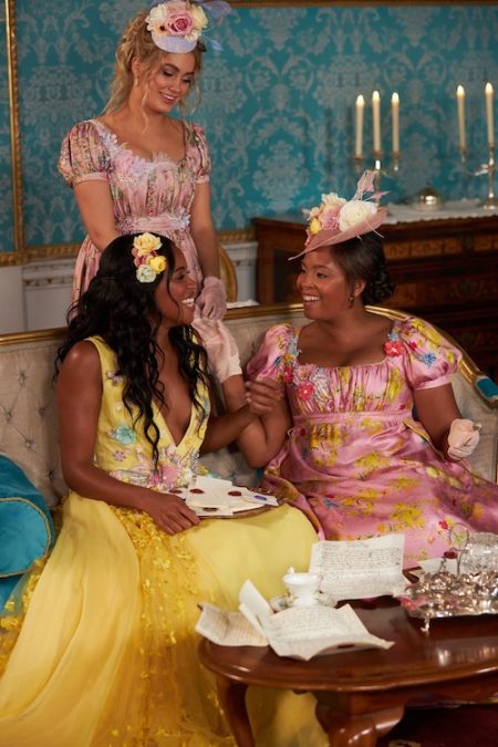 Nicole reads letters with her sister and best friend