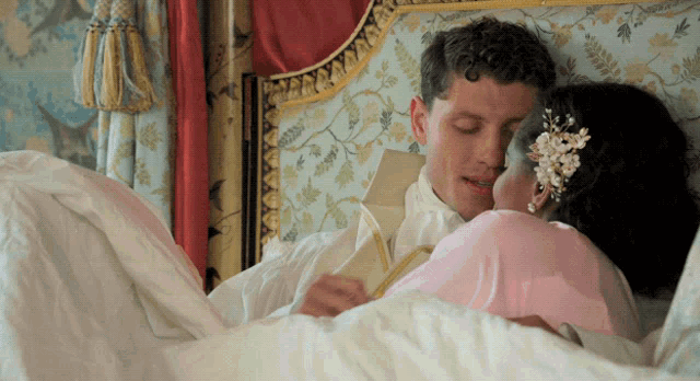 Mr Chapman and Nicole kiss