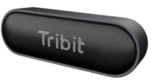 A black oval shaped bluetooth speaker with the word TRIBIT on the front