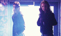 Sarah Michelle Gellar and Eliza Dushku on Buffy pulling stakes out of their pockeets and looking pretty thrilled to do damage