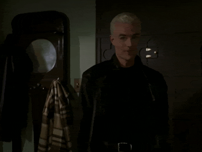 James Marsters as Spike in white slicked back hair and a leather jacket giving a very sarcastic thumbs up