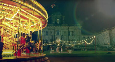 An exterior shot of the castle and the carousel