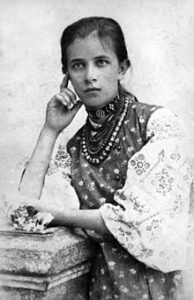 black and white photo of Olha wearing traditional clothing
