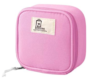 Square canvas zipper pouch in pink with a logo that says PACKING