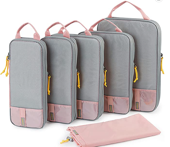 Compression Packing Cubes, in pink and grey with pink loops, grey bodies and little yellow zipper pulls