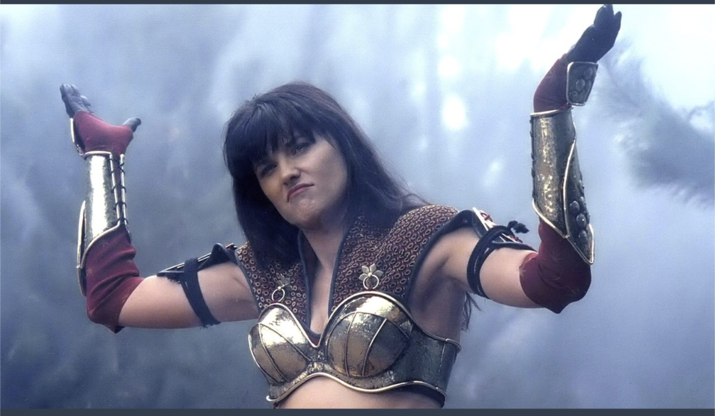 Lucy Lawless as Xena holding her arms up like a big sarcastic WELP shrug