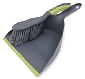 A grey and green dustpan and small broom