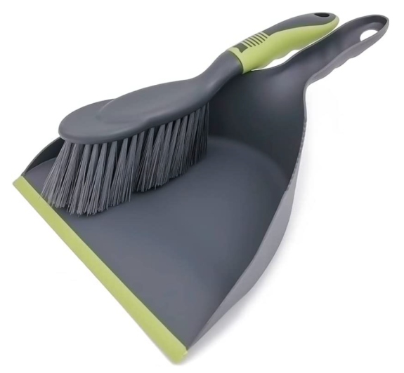 A grey and green dustpan and small broom