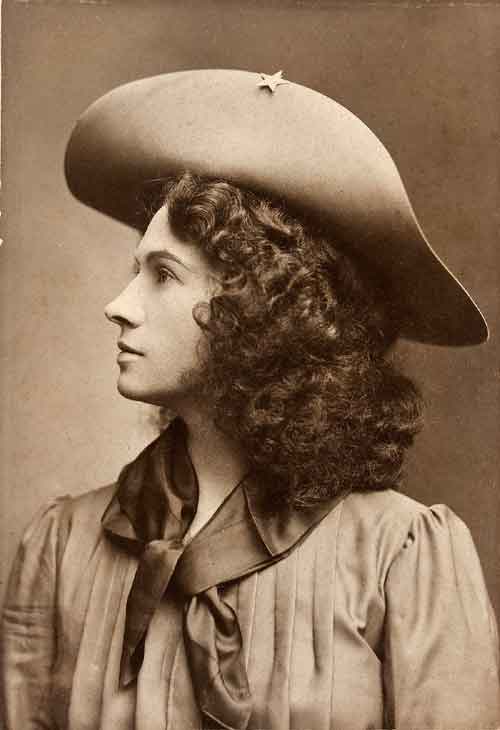 profile photo of Katy with her hair down and a cowboy hat on