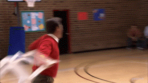 a man throws a chair