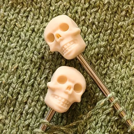 Stitch stoppers shaped like skulls