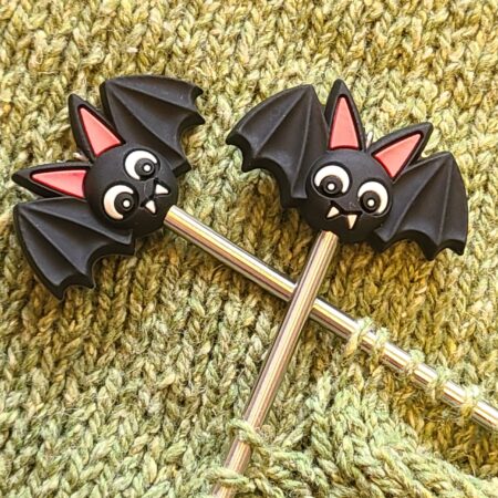 Stitch stoppers shaped like black bats