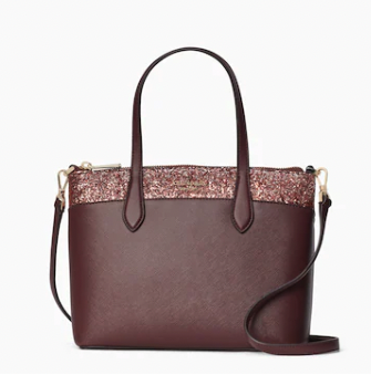 Sideview of Cherrywood Flash Glitter satchel which is a deep rose brown color with a line of rose gold glitter across the top 