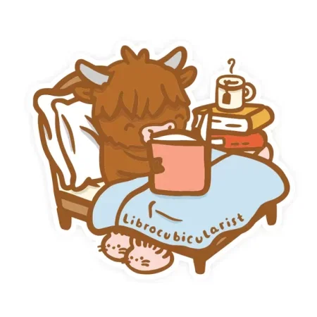 A highland cow reads in bed. There's a mug of tea and a stack of books next to him, and bunny slippers under the bed