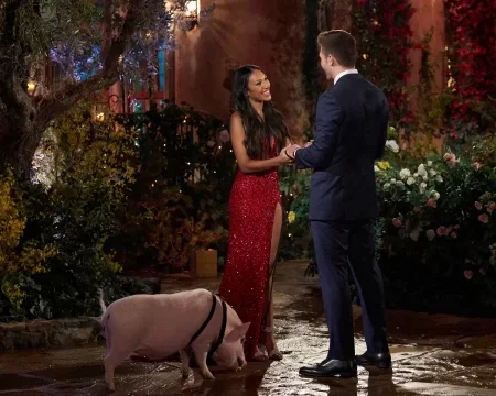 Mercedes says hi to Zach while Henry, the pig, looks ashamed to be involved in the show at all