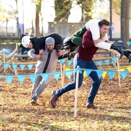 Zach runs carrying Charity