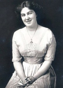 Black and white photo of Margaret Gwyer, a smiling young woman