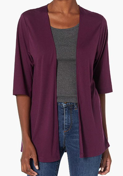 Poly/rayon three-quarter sleeve open front cardigan from Hanes in purple, styled on a Black woman with a grey t and jeans