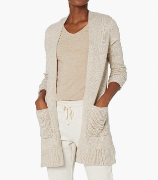Amazon knit open front cardigan with big pocket in cream, styled on a black woman wearing beige sweats, sneakers, and an oatmeal colored vneck 