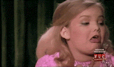 A little girl from Toddlers in Tiaras gags