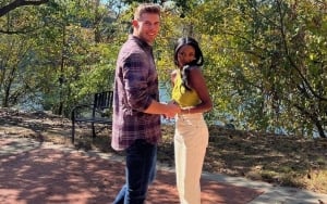 Charity and Zach smile for the camera