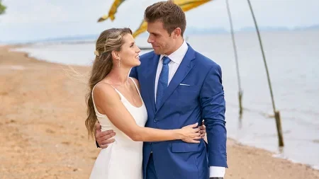 Kaity and Zach embrace on the beach