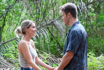 Zach and Kaity hold hands