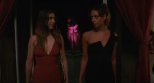 Amber in the red dress and Kat in a black dress