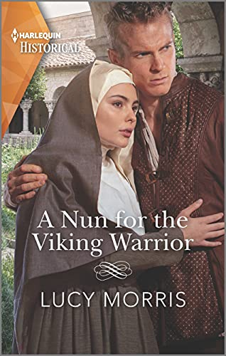 A Nun for the Viking Warrior by Lucy Morris. A nun and a stern looking blond man in brown, leather clothes are huddled together. They appear to be surprised and looking at something in the distance.