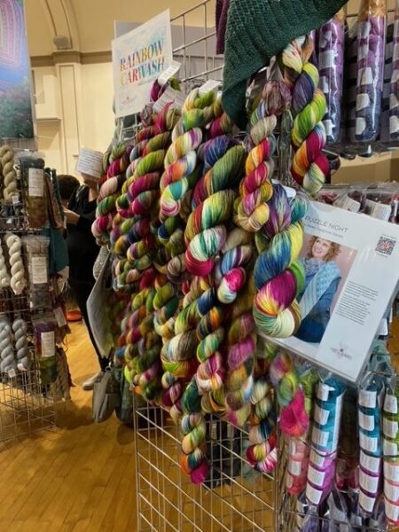 A display of Rainbow Carwash yarn