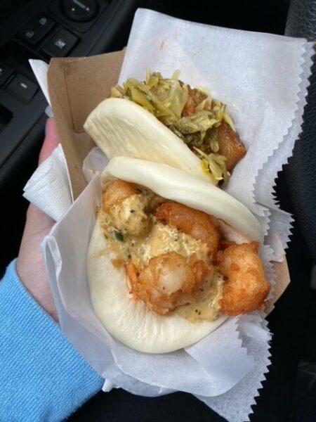 Two open faced sandwiches made with bao