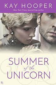 The new Summer of the Unicorn cover has a black and white picture of a woman with wavy hair and giant jewels leaning on the shoulder of a guy who is looking away from her, and it's all very modern and contemporary looking