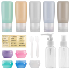 silicone travel bottles in pale green orange, and grey, with small tubs with lids, spray and pump bottles and a set of labels 