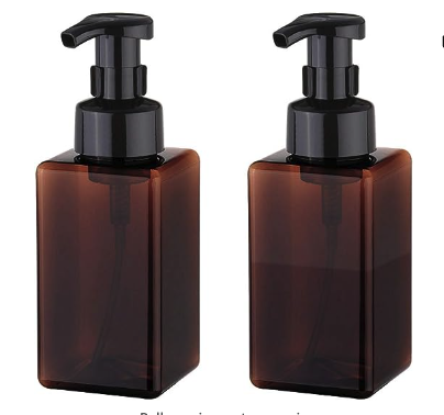 Two foaming soap dispensers with square amber bodies and black nozzles 