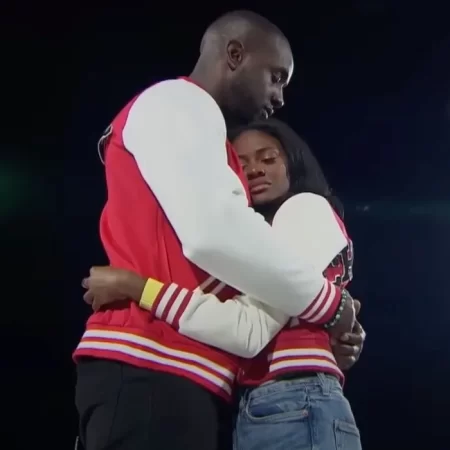 Aaron and Charity hug