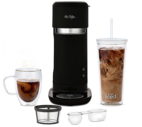Mr Coffee Iced and Hot Coffee single serve machine tower in black with an insulated tumbler, a coffee cup, a filter basket, and a scoop in front 