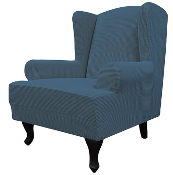 A blue wingback chair with aa blue soft jacquard fabric slipcover