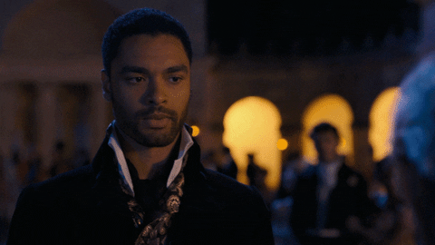 an animated gif of Rege Jean Page saying Stare into my Eyes, looking all handsome and smolder-y