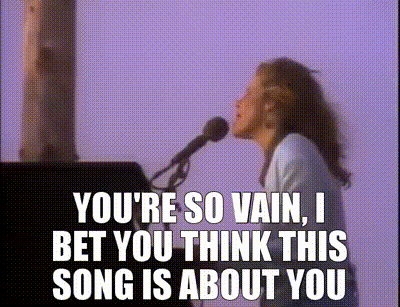 Carly Simon singing at the piano against a purple sky captioned You're so van I bet you think this song is about you
