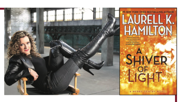 Laurell K Hamilton sitting sideways in a directors chair kicking her legs up and her legs are encased in above-the-knee leather boots. DID YOU SEE HER BOOTS?