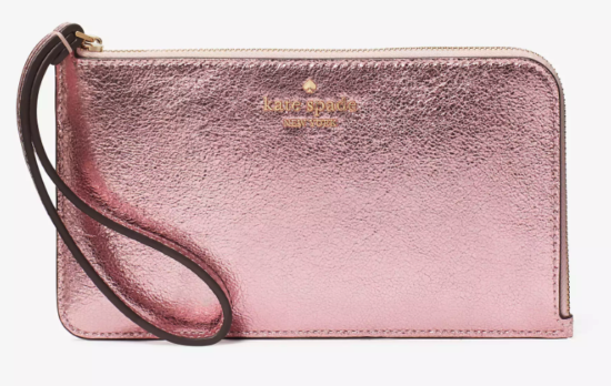 A shiny pink leather zip wristlet with a loop strap and kate spade new york in gold