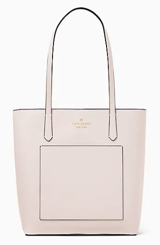 A side view of the pink totebag with kate spade new york in gold