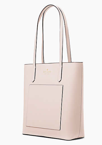 A side angle view of the bag showing the slim side profile and the side pocket on the outside 