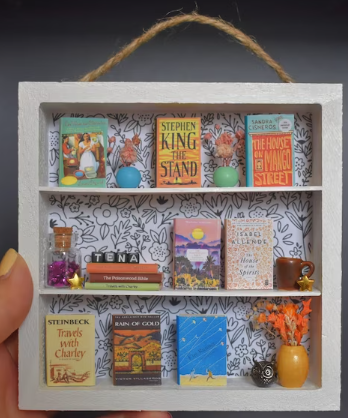 Another sample tiny bookshelf with THE STAND, HOuse of the SPIRITS, Rain of Gold and letter beads spelling out TENA
