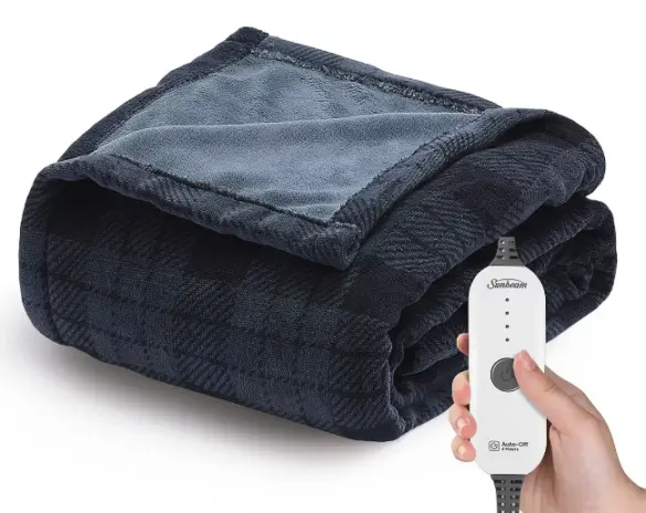 A very fuzzy blue plaid blanket with a White person's hand in front holding the electronic heat control