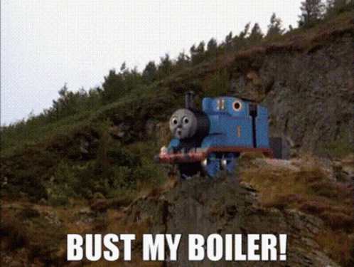 Thomas the tank engine falls off a cliff with the caption BUST MY BOILER