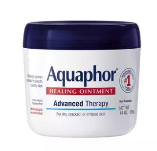 A dark blue lid on a white plastic tub that says Aquaphor healing ointment advanced therapy 