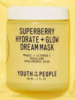 A yellow tub of face balm in a yellow background. on the bottle in black letters it says superberry hydrate + glow dream mask - youth to the people